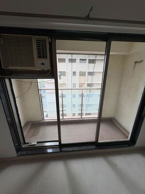 Room in 2 BHK Apartment at Oshiwara – for Rent
