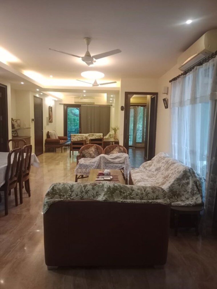 Living Room, chittaranjan park 3 Bedroom 233 Sq.Yd. Builder Floor In Chittaranjan Park Delhi 10750909