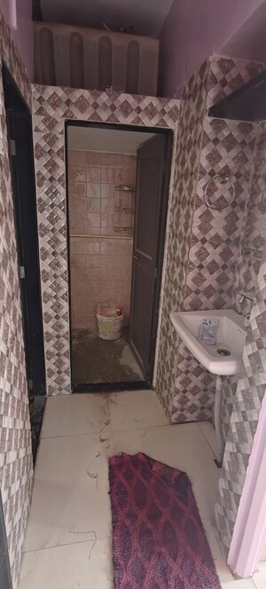 Bathroom in 1 BHK Apartment at Wadgaon Sheri – for Rent