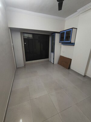 Bedroom in 2 BHK Apartment at Dheeraj Ganga, Malad West – for Rent