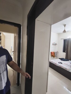 Bedroom in 2 BHK Apartment at Dheeraj Ganga, Malad West – for Rent