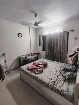 Bedroom in 2 BHK Apartment at Dheeraj Ganga, Malad West – for Rent