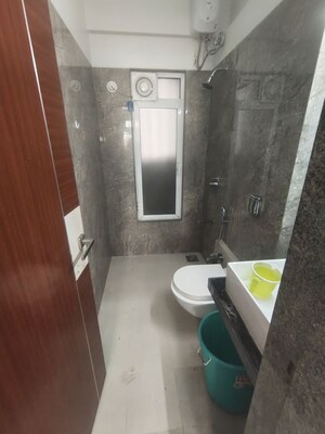Bathroom in 2 BHK Apartment at Dheeraj Ganga, Malad West – for Rent