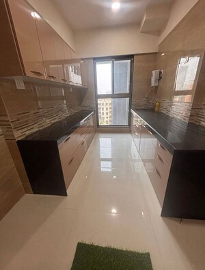 Kitchen in 2 BHK Apartment at Rajesh Raj Infinia, Malad West – for Sale