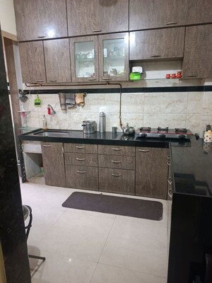 Kitchen in 1 BHK Apartment at Kunal Apartment CHS, Bhandup East – for Sale