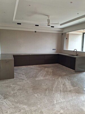 Kitchen in 4 BHK Apartment at Piplod – for Sale