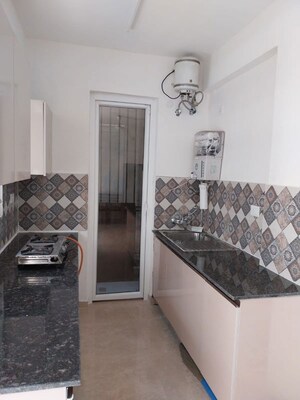 Kitchen in 2.5 BHK Apartment at Signature Global Park 4 and 5, Sohna Sector 36 – for Rent