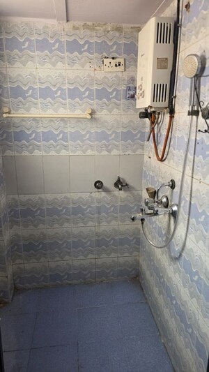Bathroom in 1 BHK Apartment at Vallabh CHS, Goregaon West – for Rent