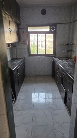 Kitchen in 1 BHK Apartment at Vallabh CHS, Goregaon West – for Rent