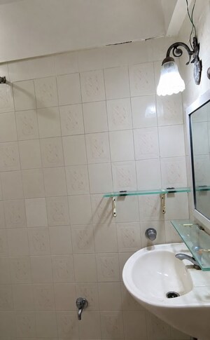 Bathroom in 1 BHK Apartment at Green Fields Apartment, Andheri East – for Rent