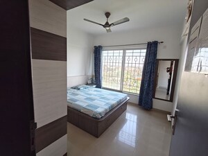 Bedroom in 2 BHK Apartment at Kolte Patil Langston, Kharadi – for Rent