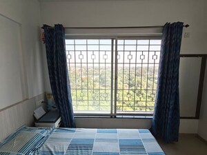 Bedroom in 2 BHK Apartment at Kolte Patil Langston, Kharadi – for Rent