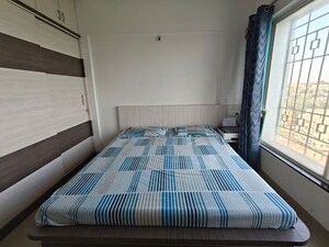 Bedroom in 2 BHK Apartment at Kolte Patil Langston, Kharadi – for Rent