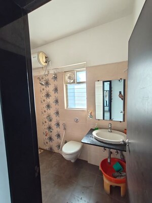 Bathroom in 2 BHK Apartment at Kolte Patil Langston, Kharadi – for Rent