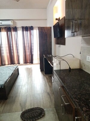 Kitchen in Studio Apartment at Paramount Golfforeste, Zeta I Greater Noida – for Rent