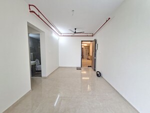 Living Room in 2 BHK Apartment at Dosti Tulip, Balkum Pada – for Rent