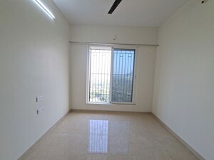 Bedroom in 2 BHK Apartment at Dosti Tulip, Balkum Pada – for Rent