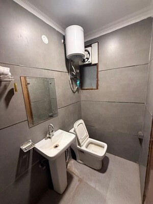 Bathroom in 1 BHK Builder Floor at Chattarpur – for Rent
