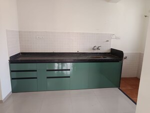 Kitchen in 2 BHK Apartment at P S Splendour County I, Wagholi – for Rent