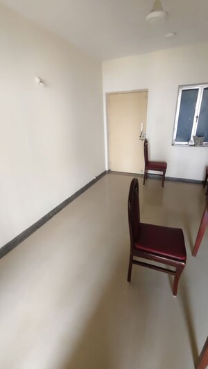 Living Room in 1 BHK Apartment at Kalpataru Hills, Manpada – for Rent