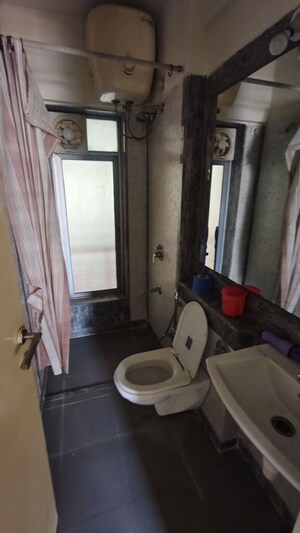Bathroom in 1 BHK Apartment at Kalpataru Hills, Manpada – for Rent