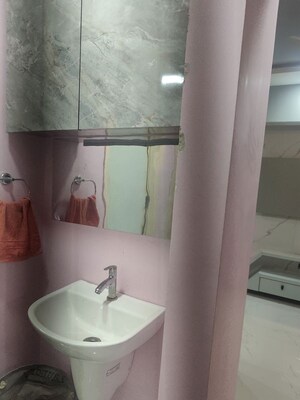 Bathroom in 1 BHK Apartment at Runwal Gardens, Dombivli East – for Rent
