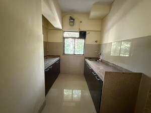 Kitchen in 1 BHK Apartment at Cosmos Enclave, Kasarvadavali – for Rent