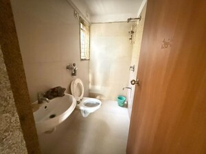 Bathroom in 1 BHK Apartment at Cosmos Enclave, Kasarvadavali – for Rent