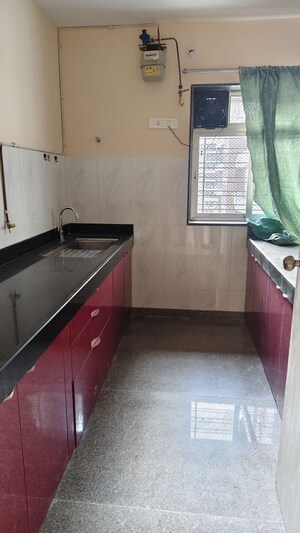 Kitchen in 2 BHK Apartment at Kalpataru Hills, Manpada – for Sale