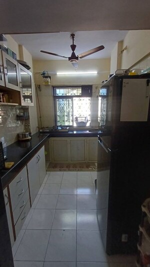 Kitchen in 2 BHK Apartment at Poonam Kirti CHS Ltd, Poonam Nagar – for Rent