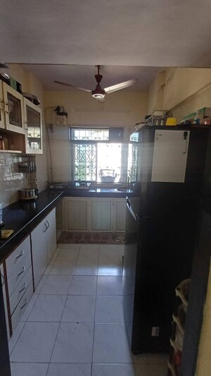 Kitchen in 2 BHK Apartment at Poonam Kirti CHS Ltd, Poonam Nagar – for Rent