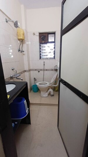 Team Area in 2 BHK Apartment at Poonam Kirti CHS Ltd, Poonam Nagar – for Rent