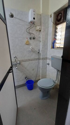 Bathroom in 2 BHK Apartment at Poonam Kirti CHS Ltd, Poonam Nagar – for Rent