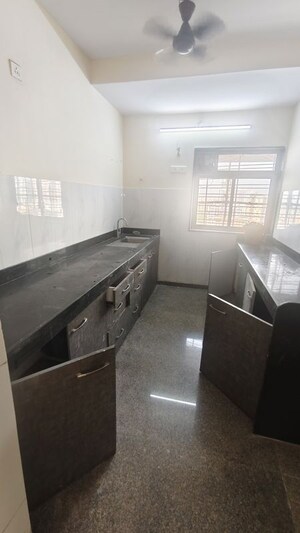 Kitchen in 2 BHK Apartment at Kalpataru Hills Phase II, Manpada – for Sale