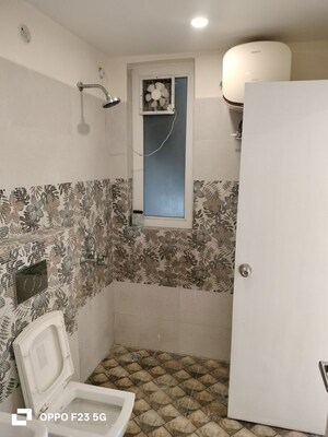 Bathroom in 4 BHK Apartment at Vibhuti Khand – for Rent