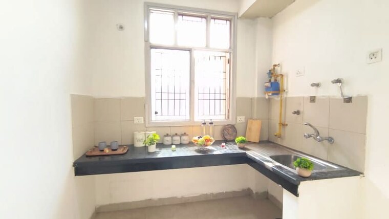 Kitchen, sector 5 wave city 2 Bedroom 932 Sq.Ft. Independent House In Sector 5 Wave City Ghaziabad 10751616