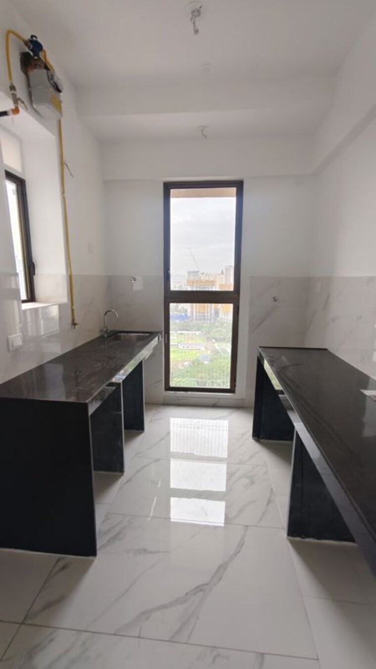 Kitchen, raymond-ten-x-era 1 Bedroom 450 Sq.Ft. Apartment In Pokhran Road No One Thane 10751691