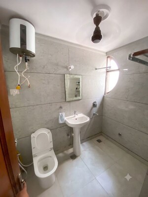 Bathroom in 2 BHK Apartment at Saffron Kanishka Tower, Sector 34 – for Rent