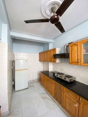 Kitchen in 2 BHK Apartment at Saffron Kanishka Tower, Sector 34 – for Rent