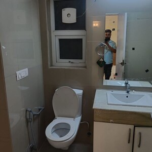 Bathroom in 2 BHK Apartment at Emaar MGF The Palm Drive Studios, Sector 66 – for Rent