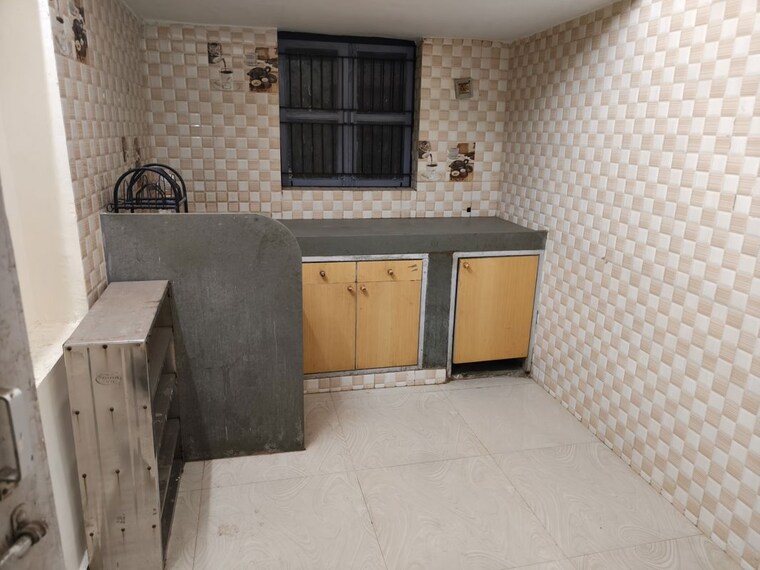 Kitchen, satellite 1.5 Bedroom 990 Sq.Ft. Villa In Satellite Ahmedabad 10751733