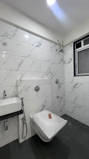 Bathroom in 1 BHK Apartment at Shreejee Skymont Siddhi, Dahisar East – for Sale