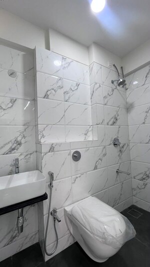 Bathroom in 1 BHK Apartment at Shreejee Skymont Siddhi, Dahisar East – for Sale