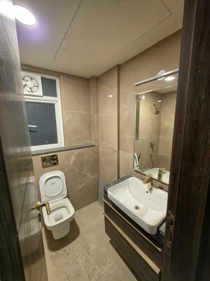 Bathroom in 2 BHK Apartment at Smart World Orchard, Sector 61 – for Rent