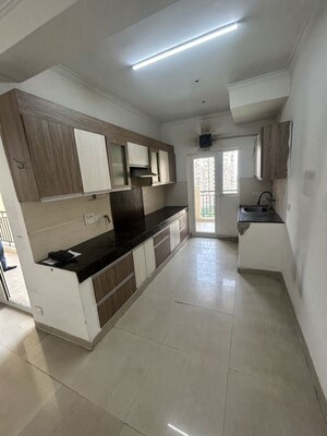 Kitchen in 3 BHK Apartment at Paramount Floraville, Sector 137 – for Rent