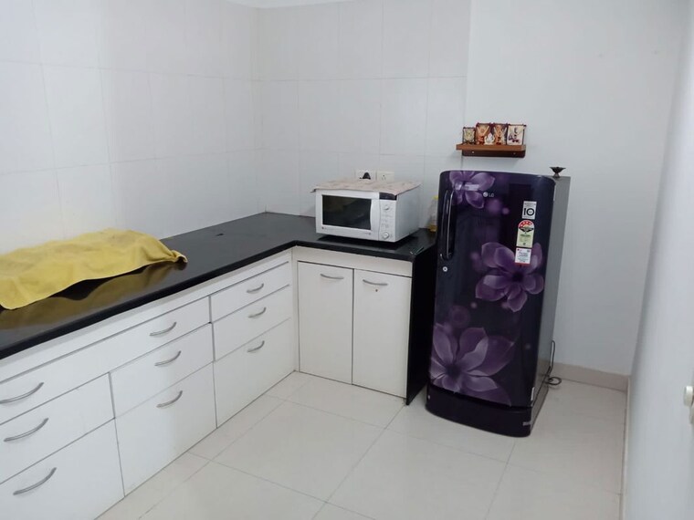 Kitchen, paranjape-blue-ridge 2 Bedroom 870 Sq.Ft. Apartment In Hinjewadi Pune 10751797