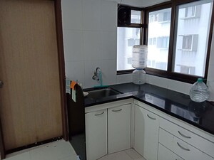 Kitchen in 2 BHK Apartment at Paranjape Blue Ridge, Hinjewadi – for Rent