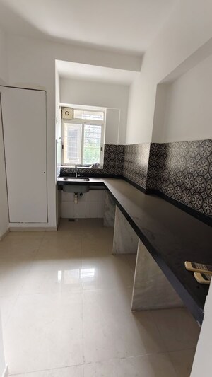 Kitchen in 2 BHK Apartment at Lodha Amara, Kolshet Road – for Rent