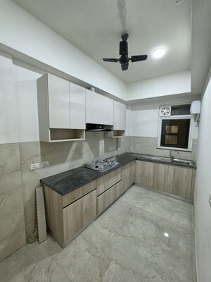 Kitchen in 2 BHK Apartment at Smart World Orchard, Sector 61 – for Rent