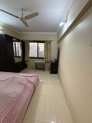 Bedroom in 3 BHK Apartment at Green Valley CHS, Wanwadi – for Rent